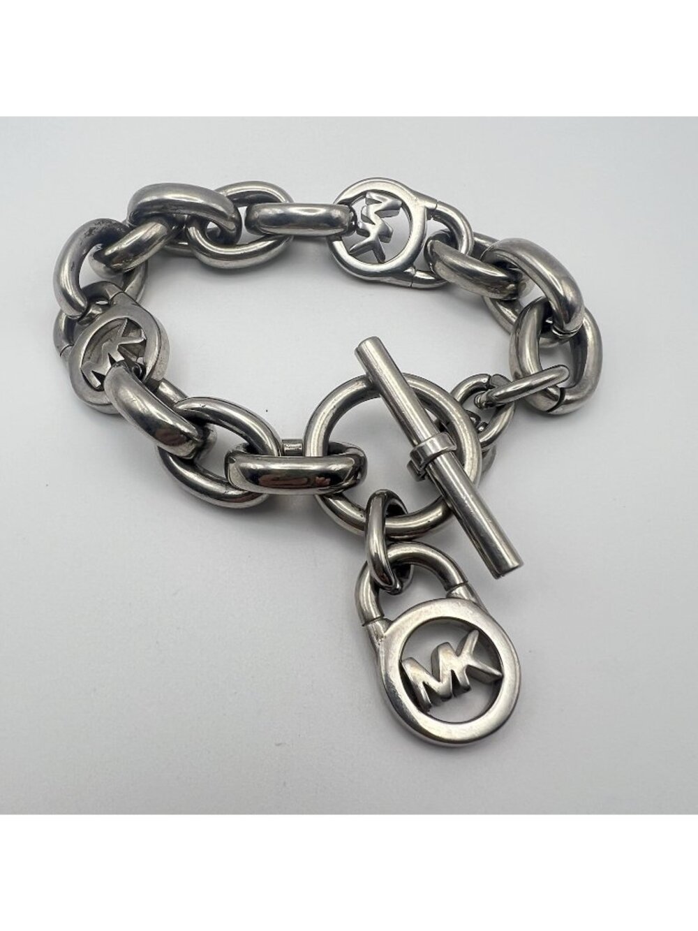 Michael Kors MK Logo Padlock Silver Tone Chunky Link Chain Toggle Bracelet 8"